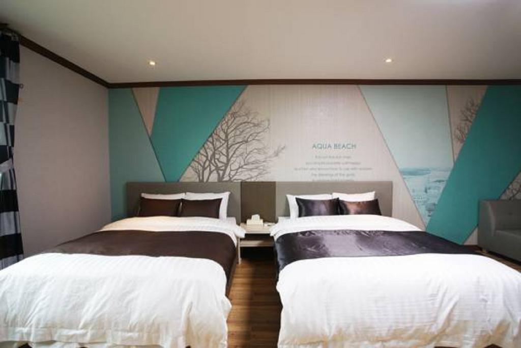 Seongsan Aqua Beach Hotel Сеогвипо Стая снимка
