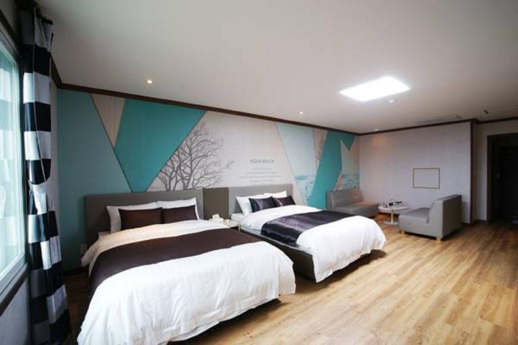 Seongsan Aqua Beach Hotel Сеогвипо Стая снимка