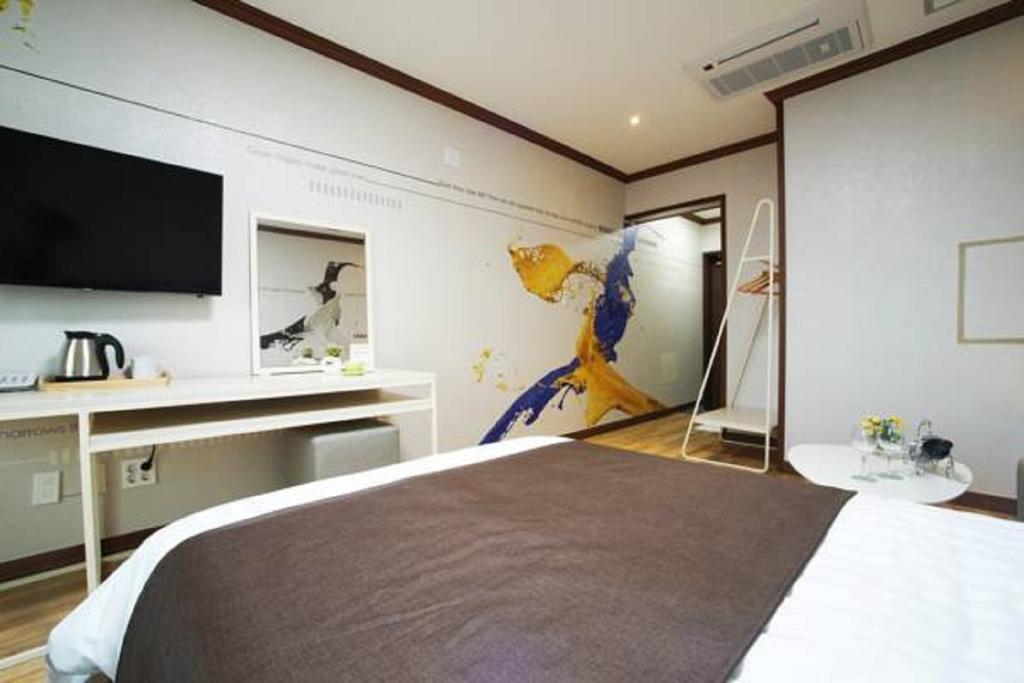 Seongsan Aqua Beach Hotel Сеогвипо Стая снимка